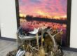 Dead mount duck display built into a layout boat with marsh grass habitat and a painted sunset marsh backdrop