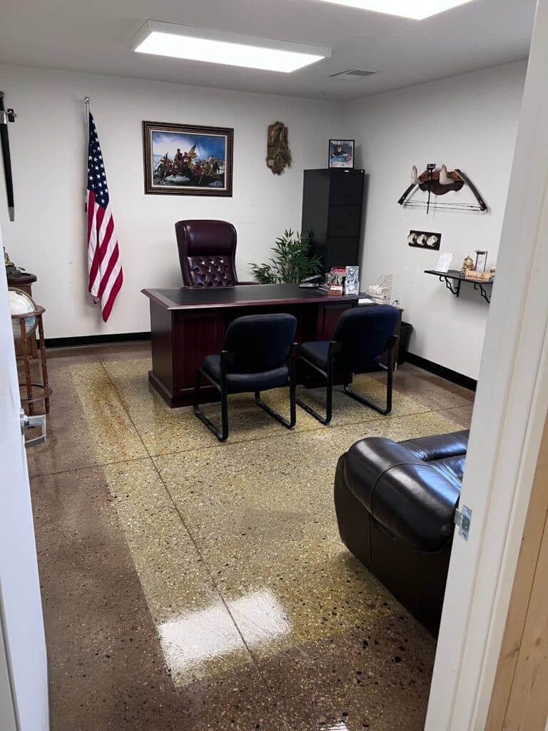 Stehling's Taxidermy office with an American flag and a framed Washington Crossing the Delaware print